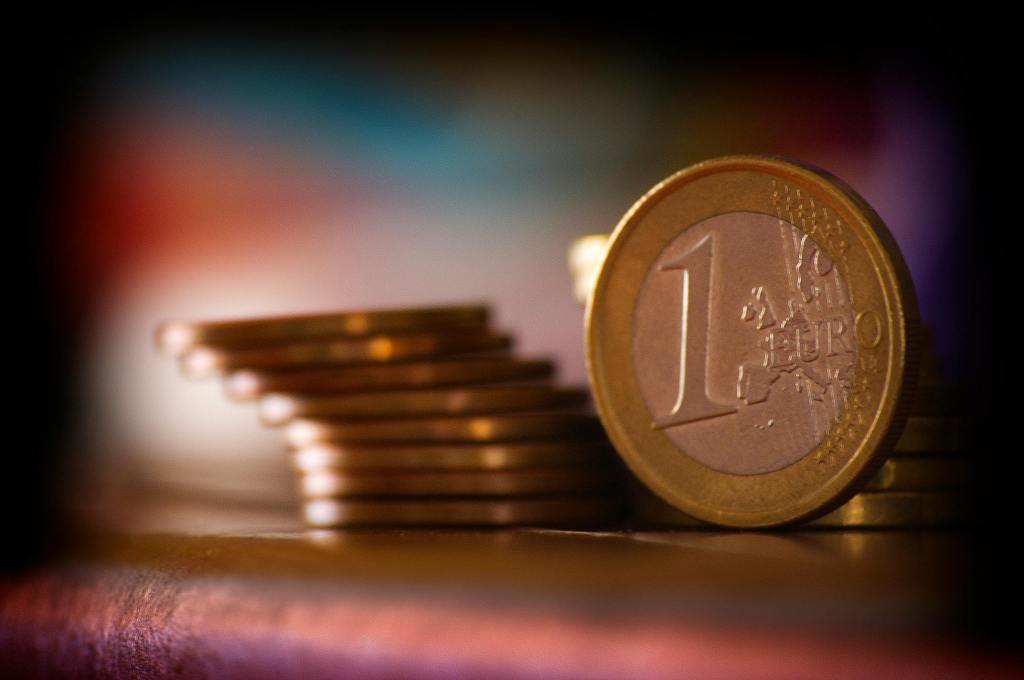 Stack of euro coins with a one-euro coin in the foreground, symbolising EU funding or budget.